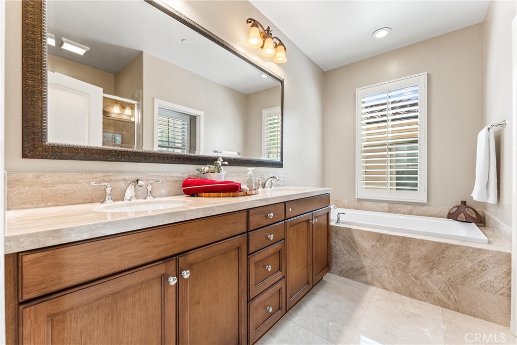 37 Peony Irvine, CA 92618 - Photo 23 of 56 Marble around the tub and on the floor.