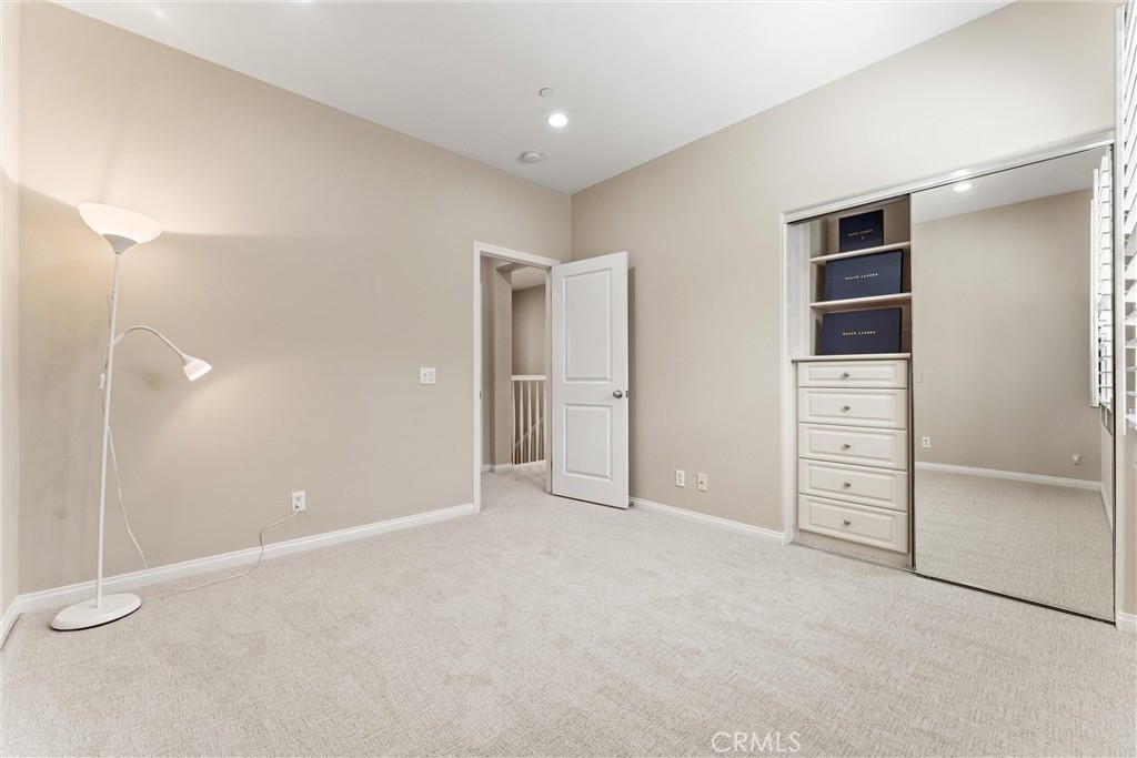37 Peony Irvine, CA 92618 - Photo 28 of 56 A closet organizer in the 2nd bedroom.