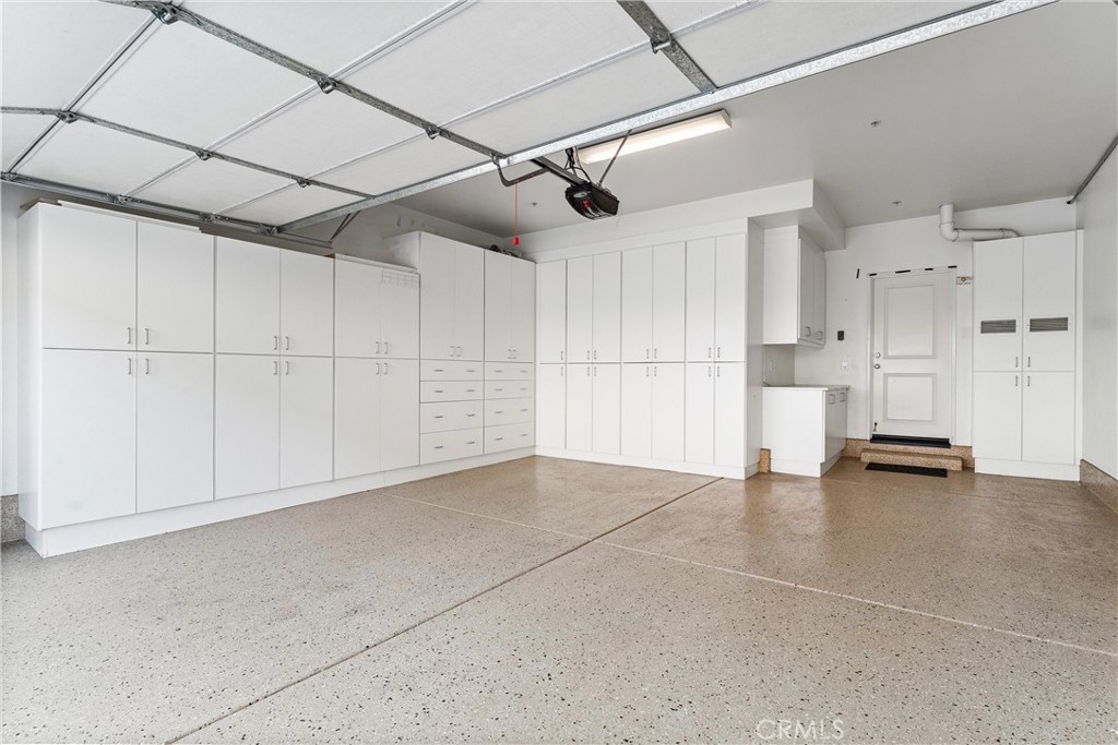 37 Peony Irvine, CA 92618 - Photo 32 of 56 Epoxy flooring and custom cabinetry.