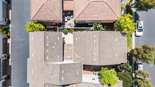 a view of a yard with potted plants