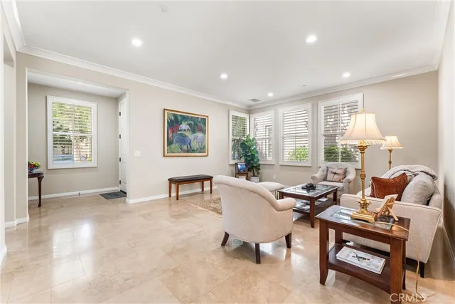 a living room with furniture and a table
