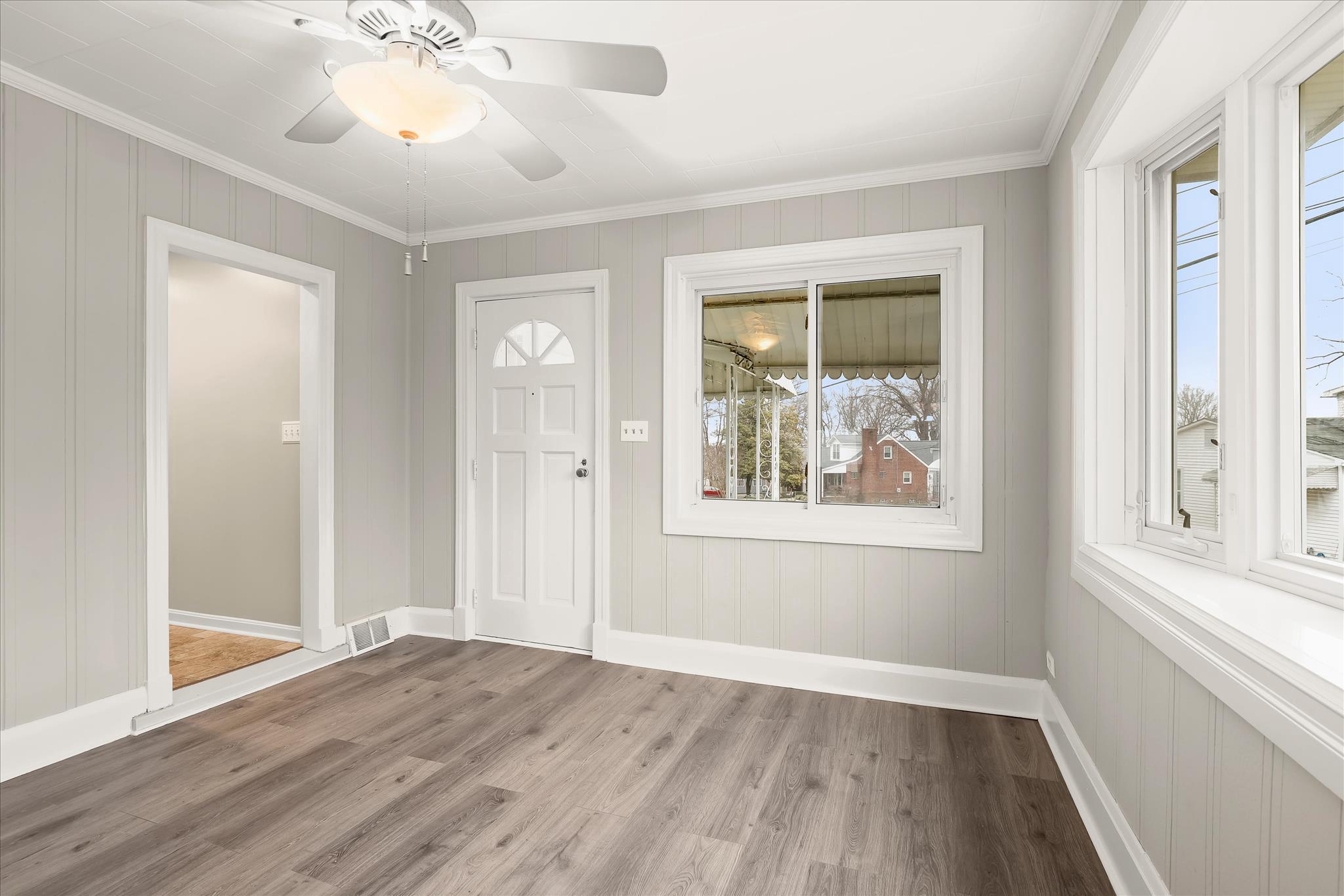 1218 Rustic Avenue Rosedale, MD 21237 - Photo 6 of 34 Sun Filled Living Room with Ceiling Fan