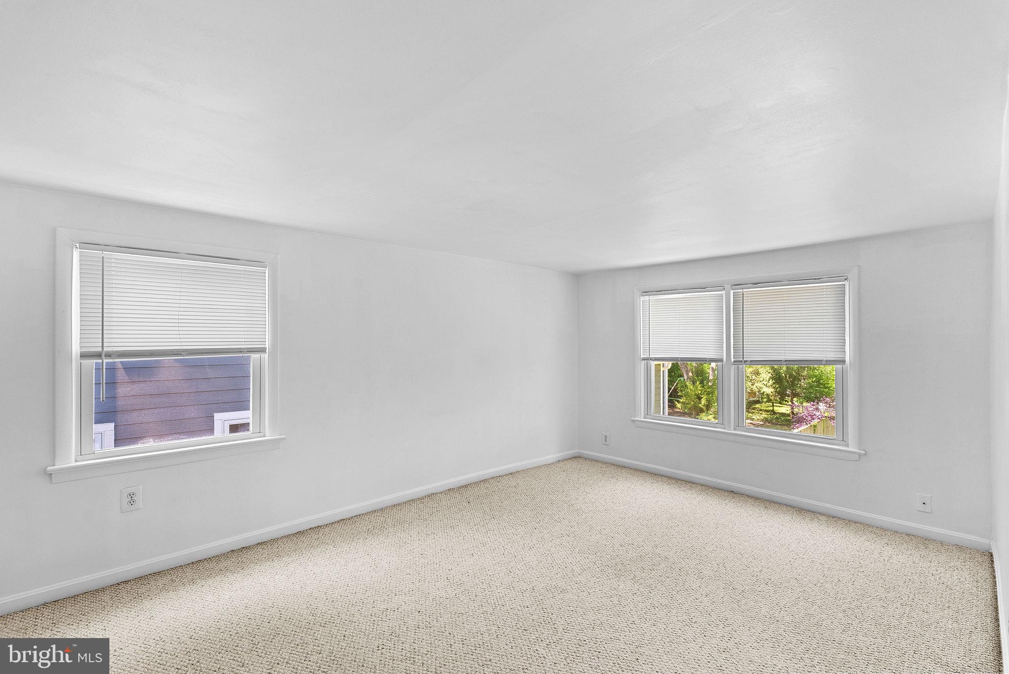 3103 Plyers Mill Road Kensington, MD 20895 - Photo 23 of 32 an empty room with a window