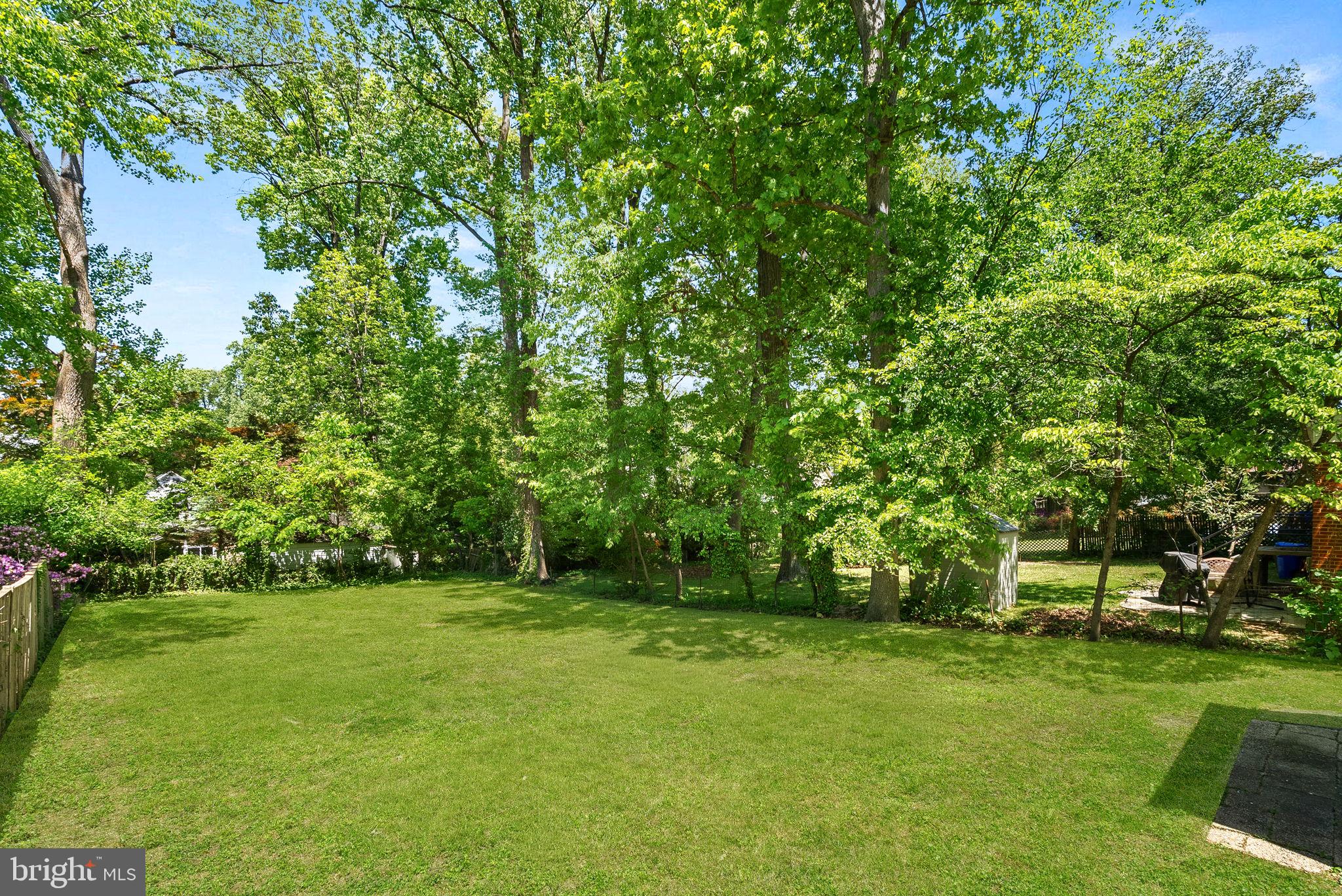 3103 Plyers Mill Road Kensington, MD 20895 - Photo 32 of 32 a view of green field with trees in the background