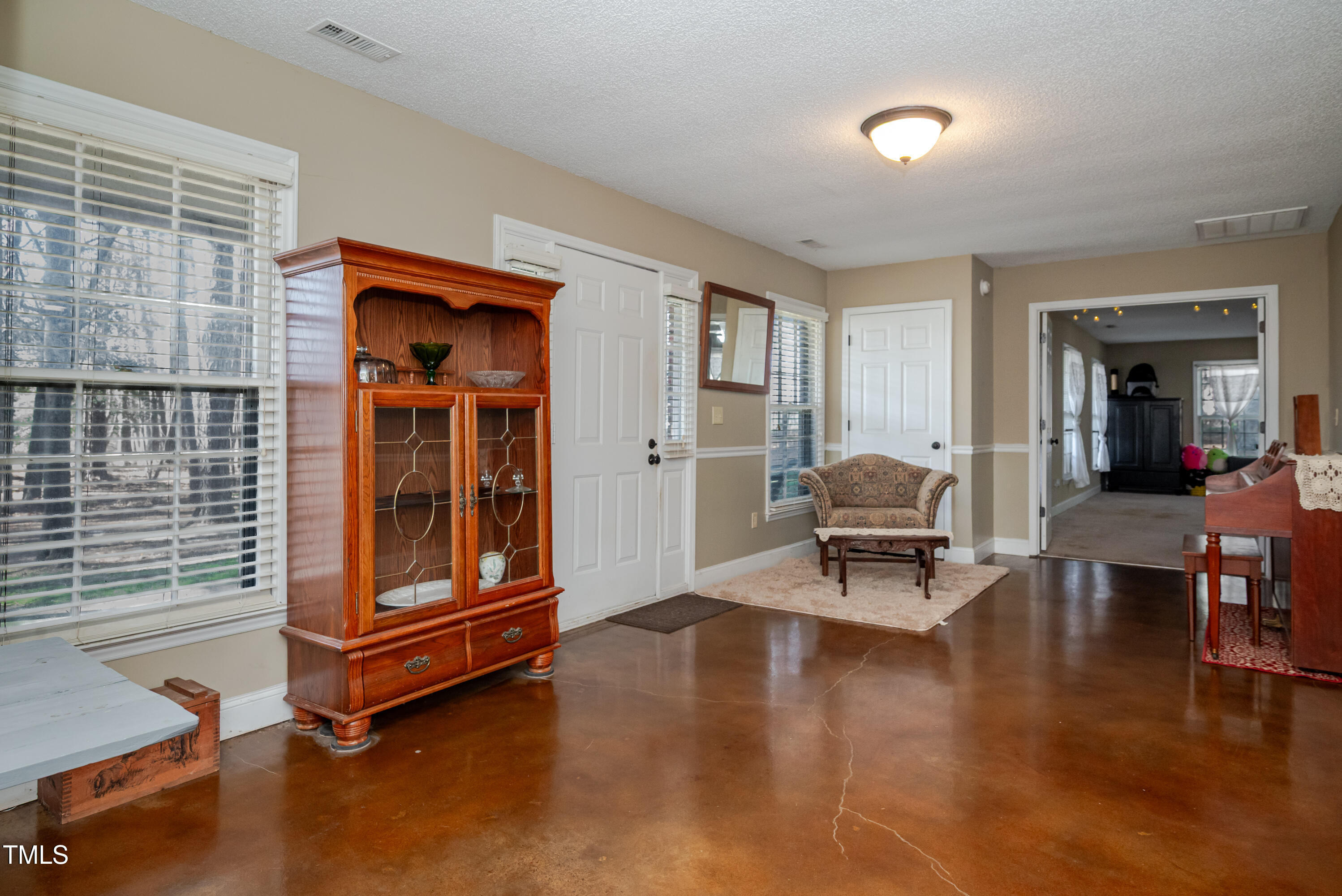 4105 Lassiter Road Wake Forest, NC 27587 - Photo 8 of 50 a living room with furniture pool table and windows