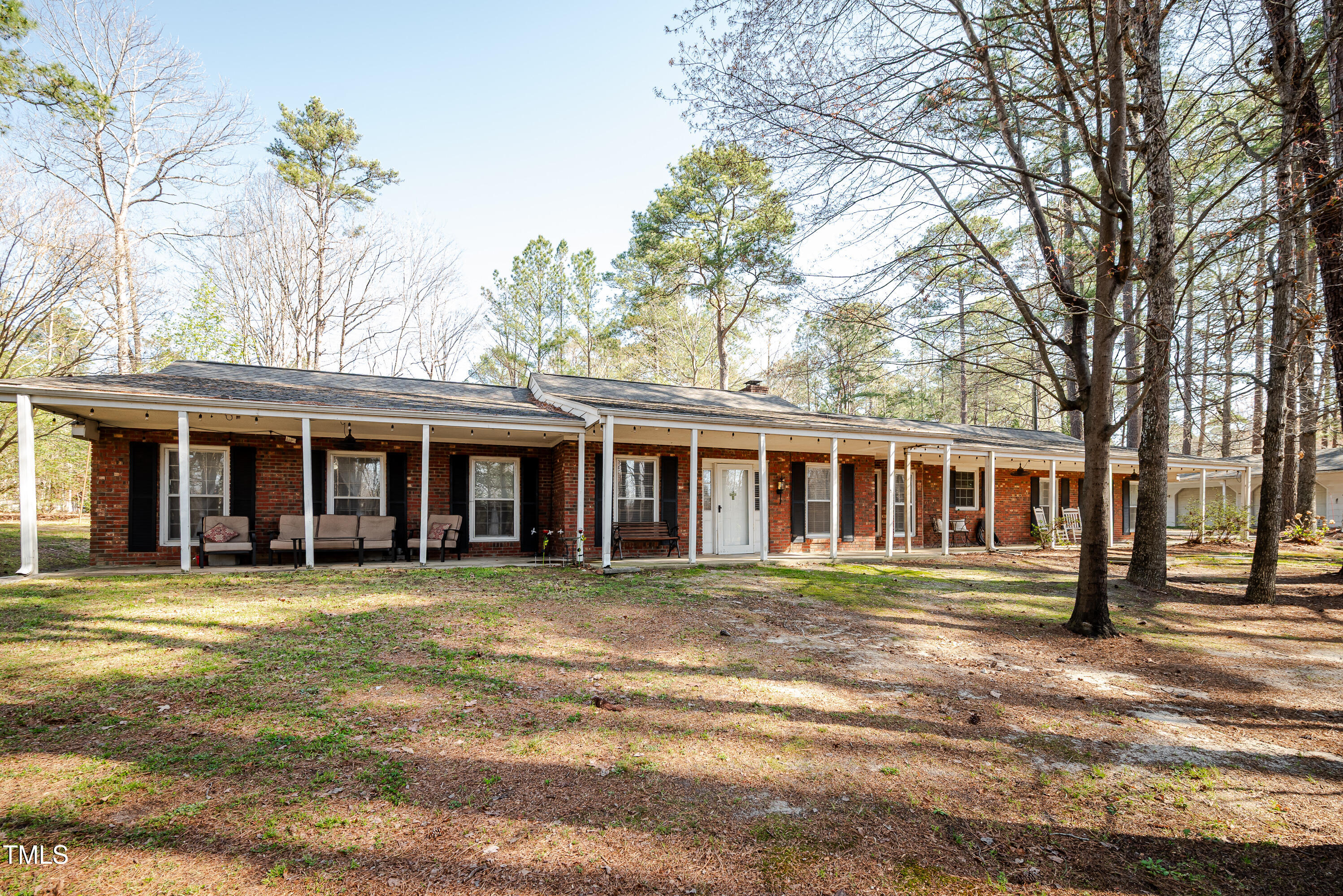 4105 Lassiter Road Wake Forest, NC 27587 - Photo 15 of 50 a front view of a house with a garden
