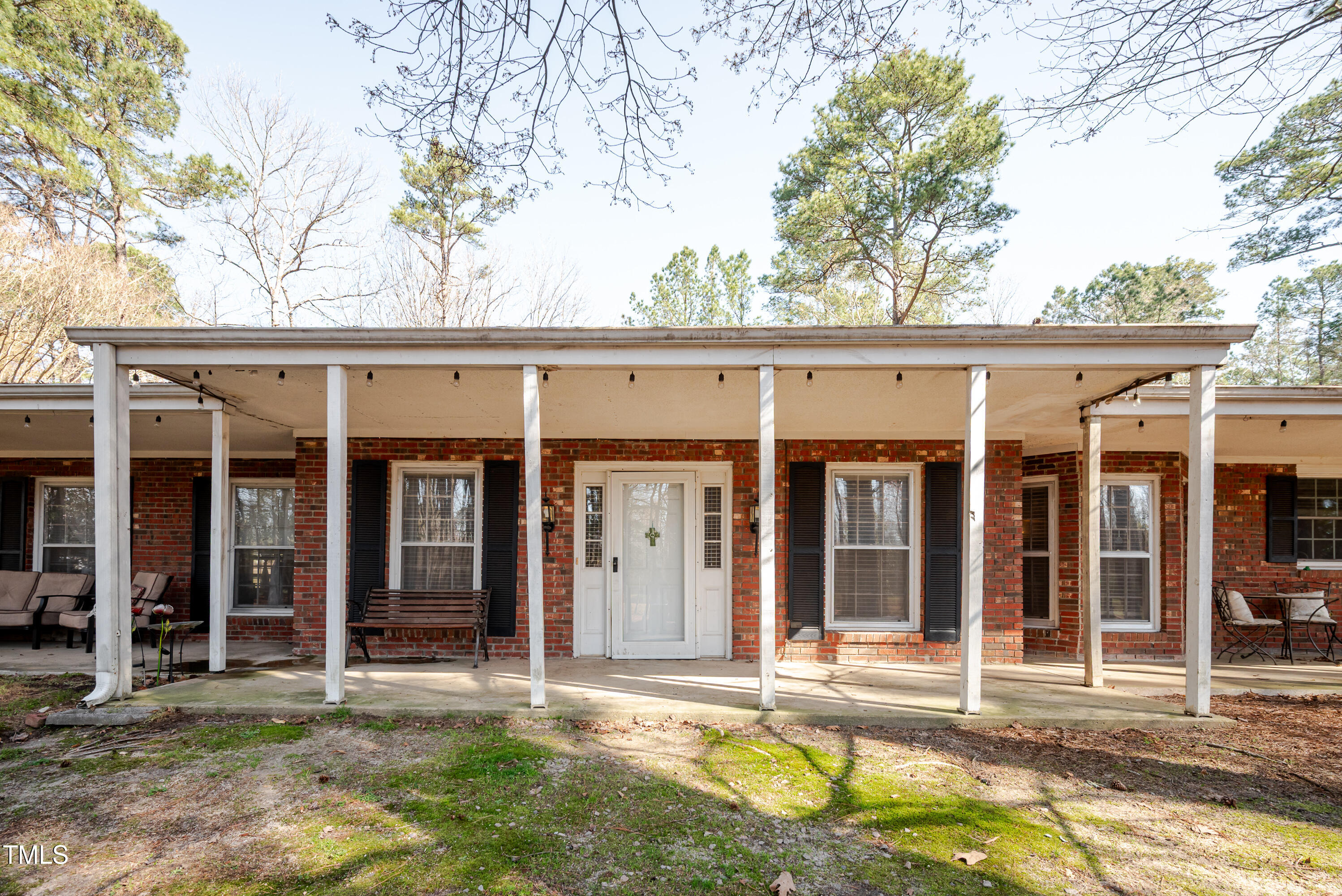 4105 Lassiter Road Wake Forest, NC 27587 - Photo 17 of 50 front view of a house with a yard