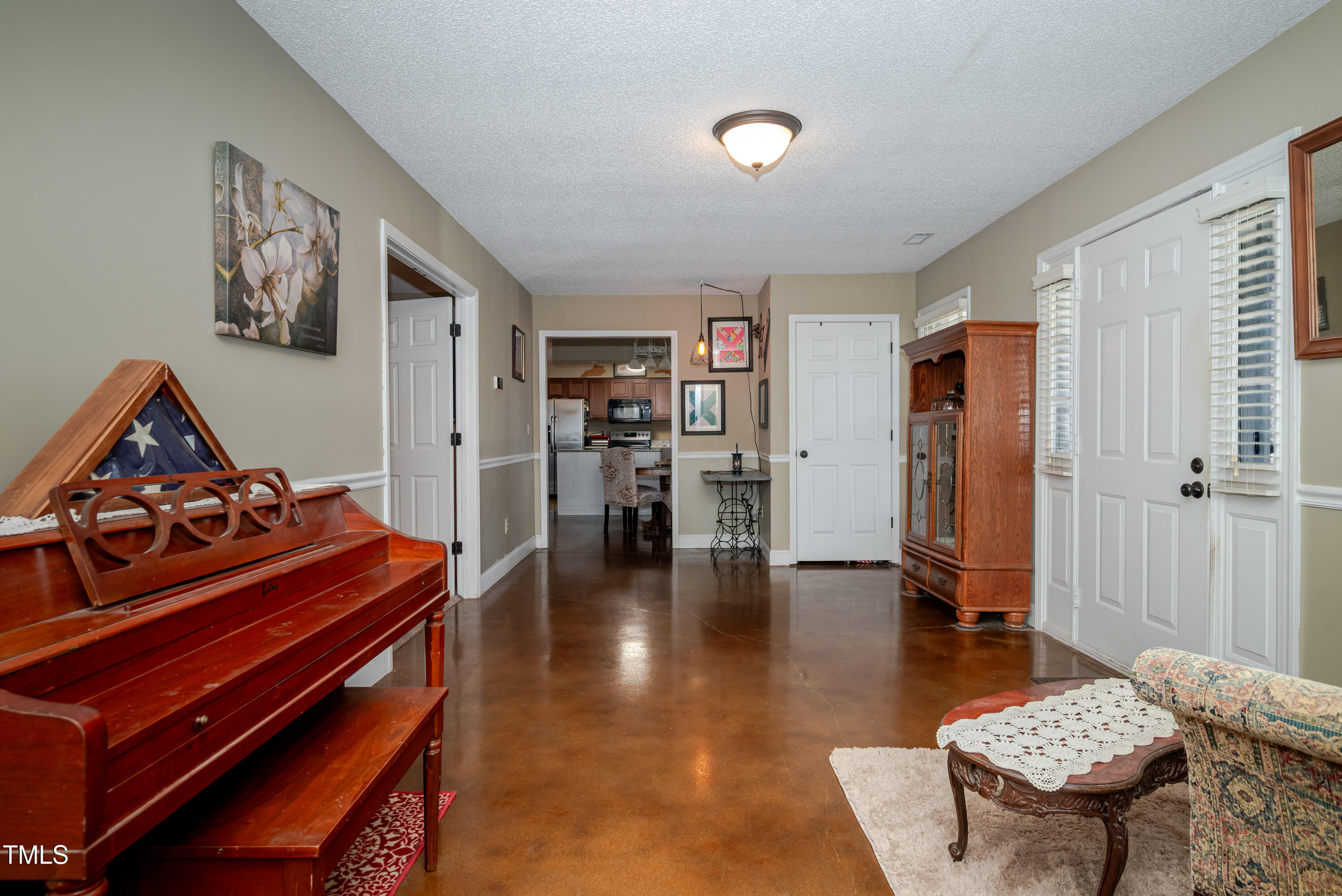 4105 Lassiter Road Wake Forest, NC 27587 - Photo 43 of 50 a room with furniture and a rug