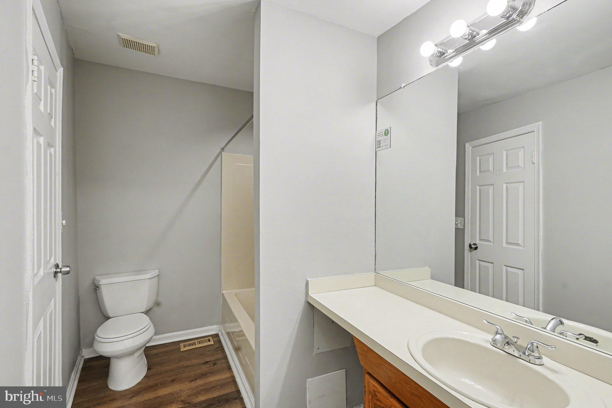 613 Harvey Street Baltimore, MD 21230 - Photo 18 of 33 Modern bathroom with sleek design.