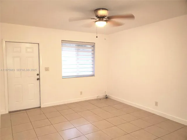 a view of a room with a window