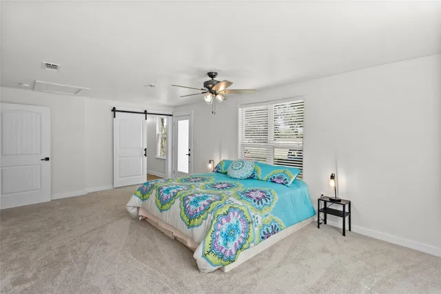 a view of a room with racks on the wall