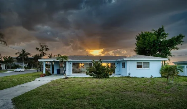 front view of a house with a yard