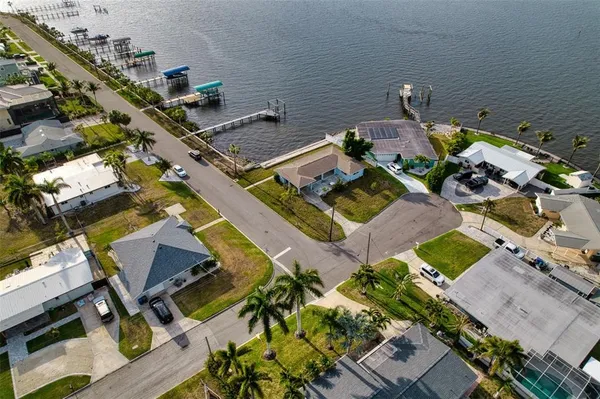 an aerial view of a house with a garden