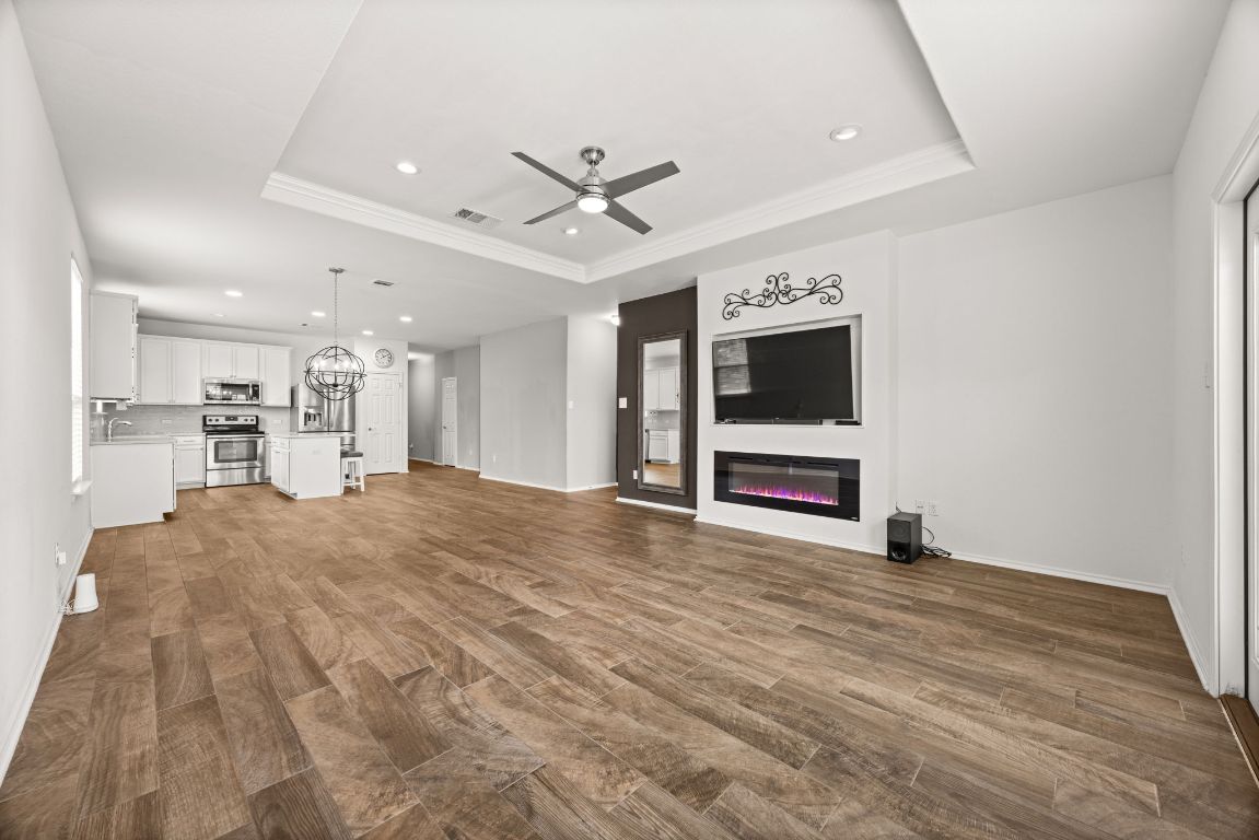 125 Hopen Cove Leander, TX 78641 - Photo 8 of 20 a view of a livingroom with a flat screen tv