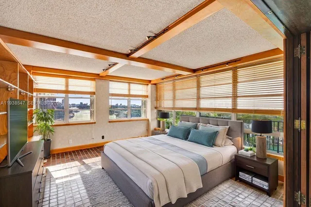 a picture of a brick wall with a large window