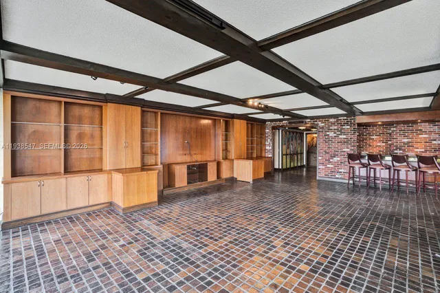 a room with a bed and window