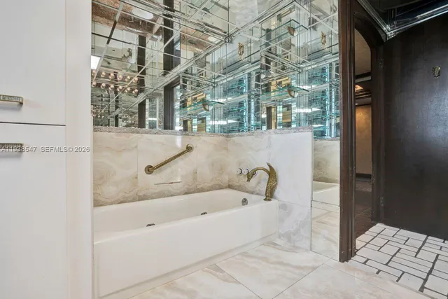 a dining room with furniture window and outside view