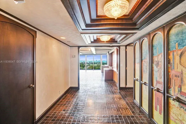 a kitchen with stainless steel appliances granite countertop a refrigerator and a stove