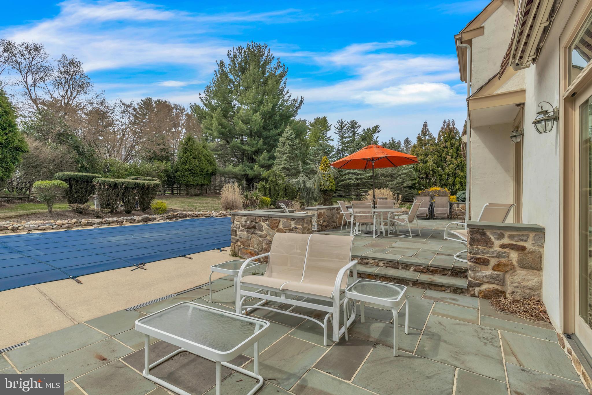 292 Church Road Devon, PA 19333 - Photo 17 of 21 a patio with tables and chairs