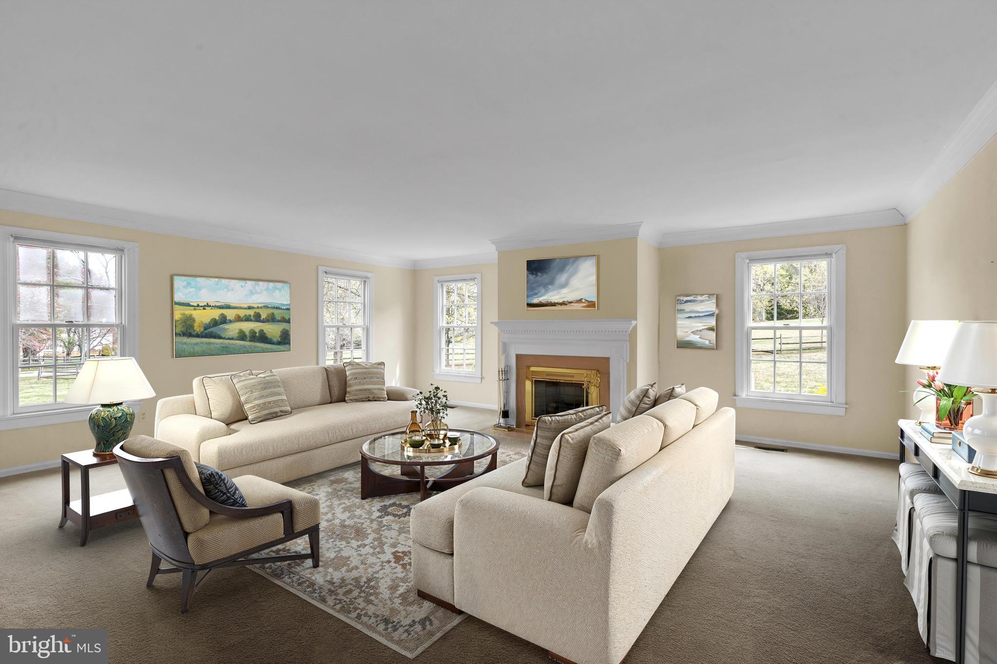 292 Church Road Devon, PA 19333 - Photo 3 of 21 a living room with furniture and a fireplace
