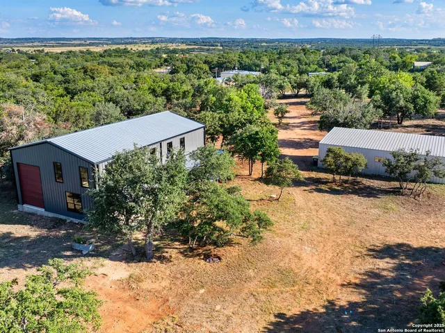 a view of a back yard with green space