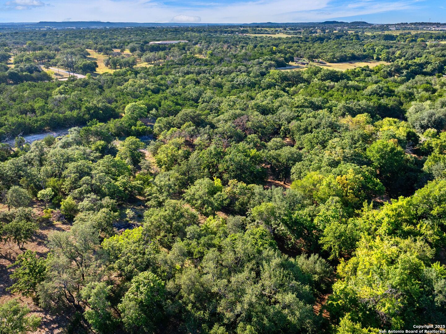 110 Moellering Road Fredericksburg, TX 78624 - Photo 20 of 20 an aerial view of a houses with a yard