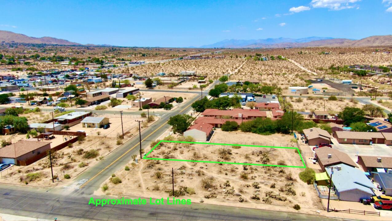 210 Chollita Road Joshua Tree, CA 92252 - Photo 1 of 32 an aerial view of residential houses with outdoor space