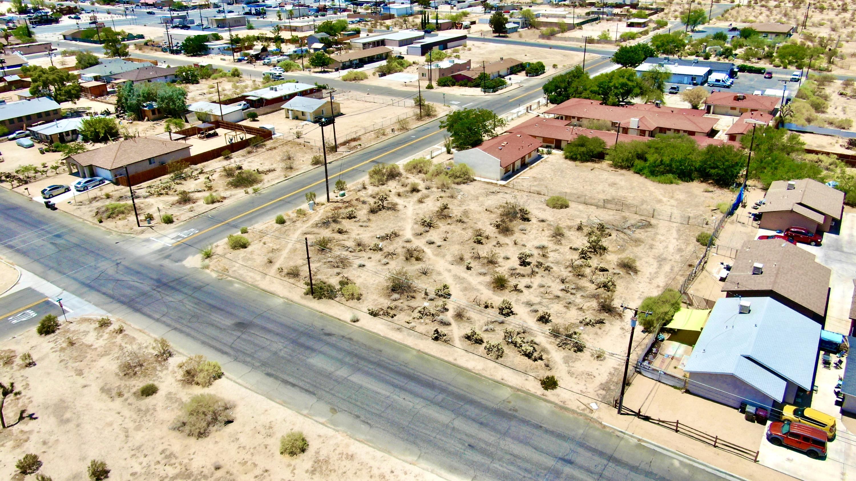 210 Chollita Road Joshua Tree, CA 92252 - Photo 29 of 32 an aerial view of residential houses with wooden floor