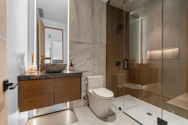 a living room with fireplace furniture and a flat screen tv