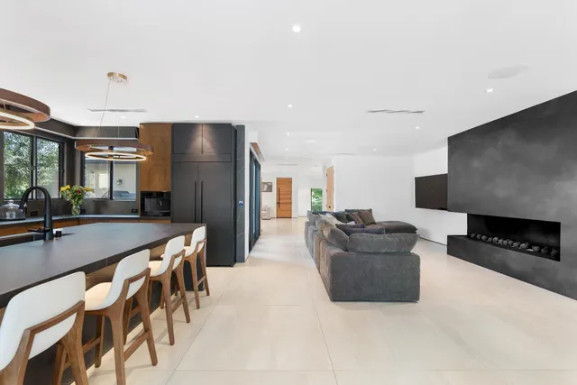 a kitchen with stainless steel appliances a sink and counter space