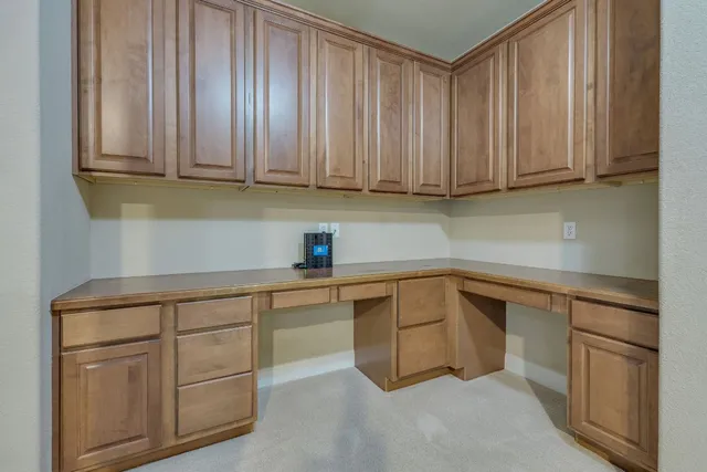 a bathroom with a sink vanity and a mirror