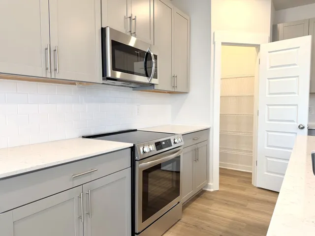 a bathroom with a bathtub and shower