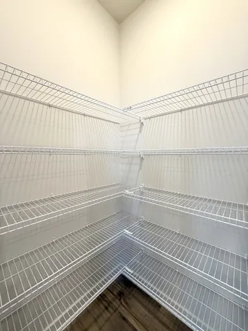 a kitchen with a sink cabinets and stainless steel appliances