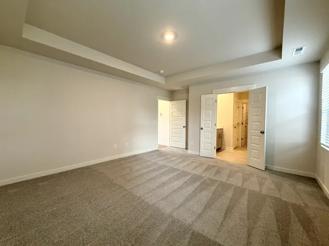a bathroom with a double vanity sink and mirror