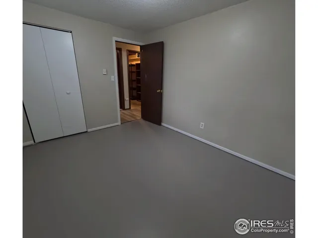 an empty room with closet