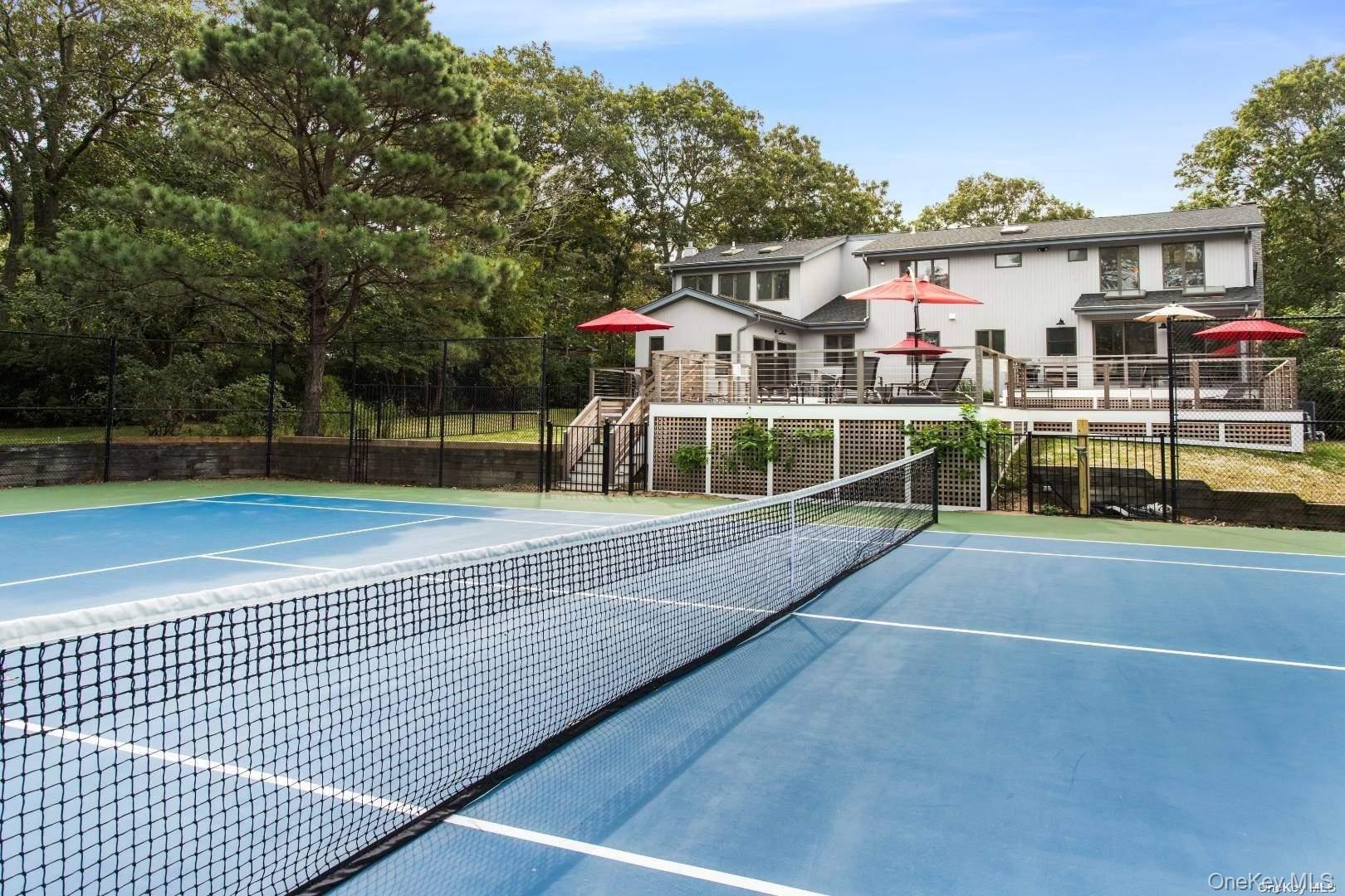 7 Harbor Road Hampton Bays, NY 11946 - Photo 2 of 22 a view of a house with a outdoor space