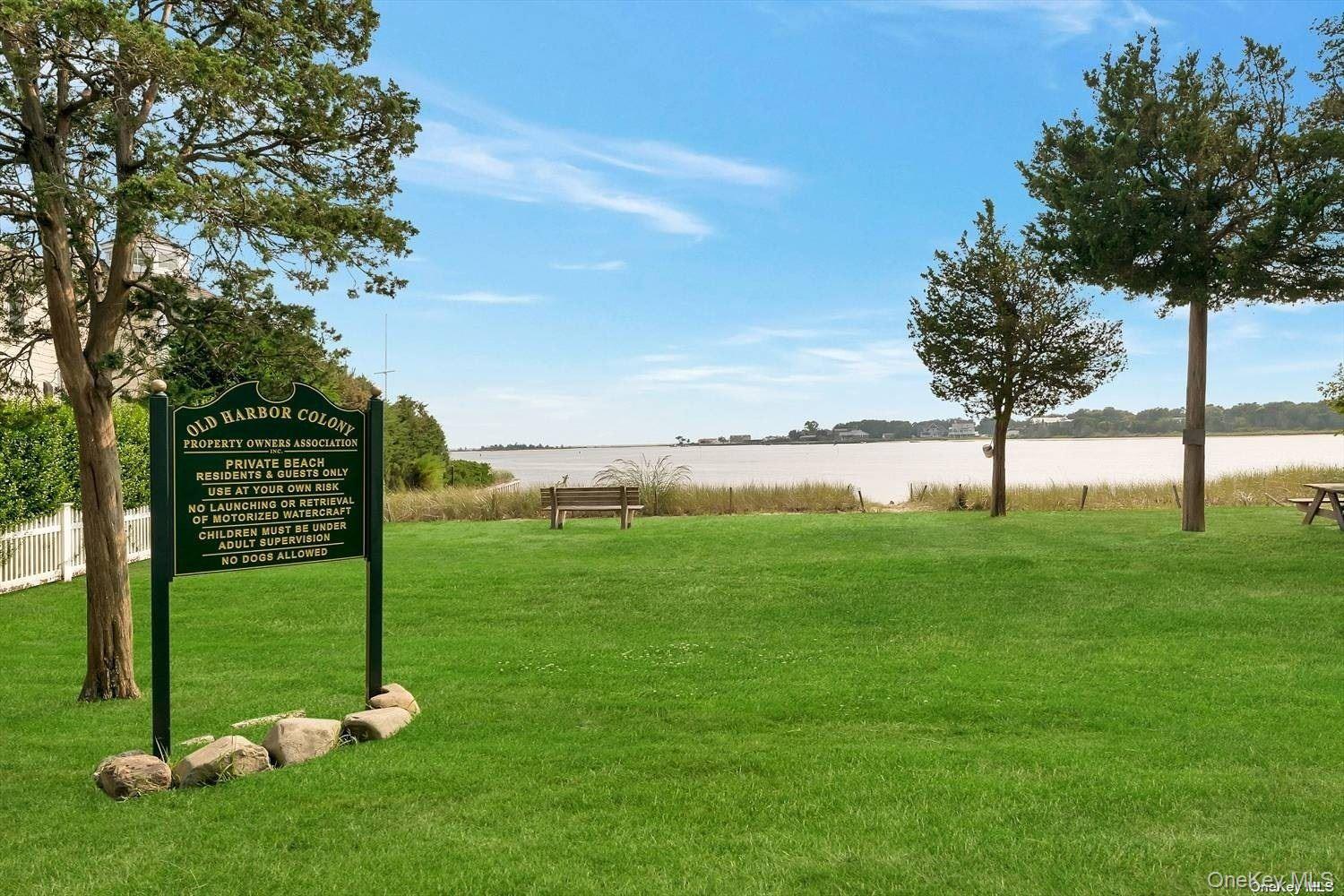 7 Harbor Road Hampton Bays, NY 11946 - Photo 21 of 22 a view of a park with large trees