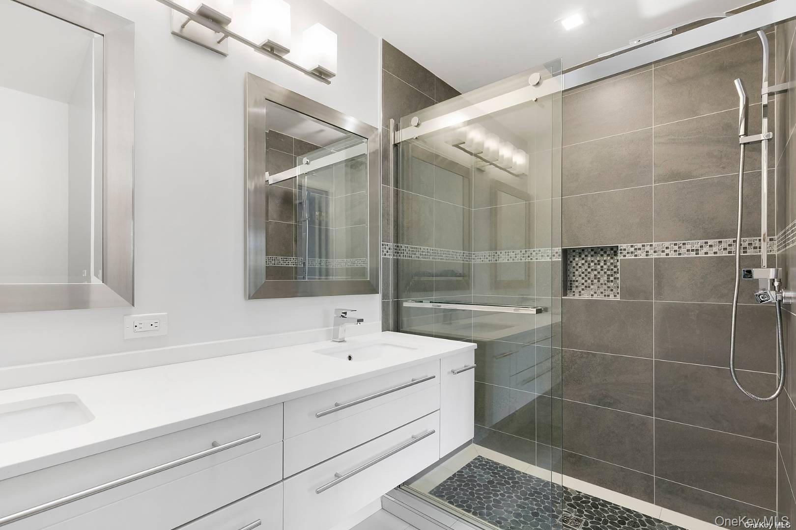 7 Harbor Road Hampton Bays, NY 11946 - Photo 7 of 22 a bathroom with a shower and a sink