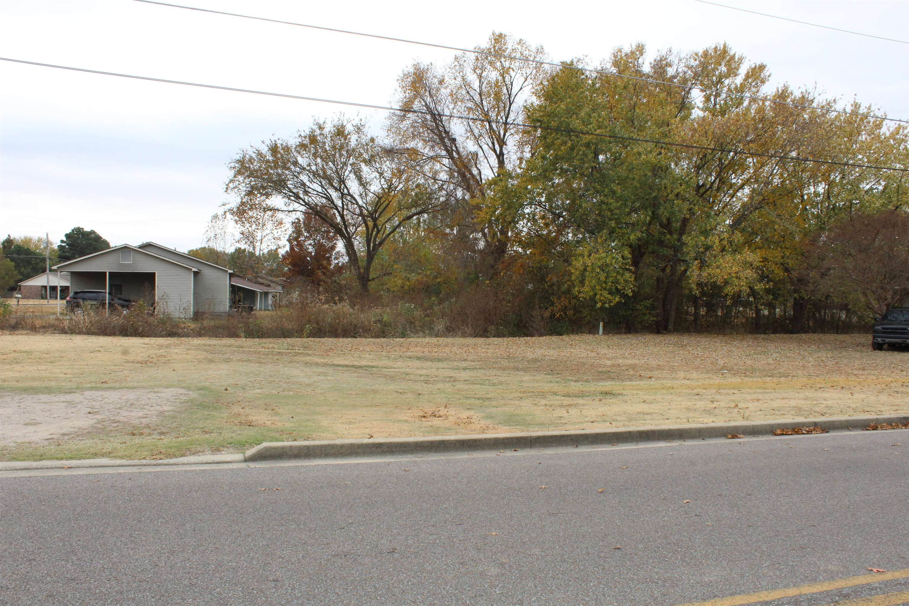 0 Wayne Avenue Ripley, TN 38063 - Photo 1 of 8 a view of a house with a yard