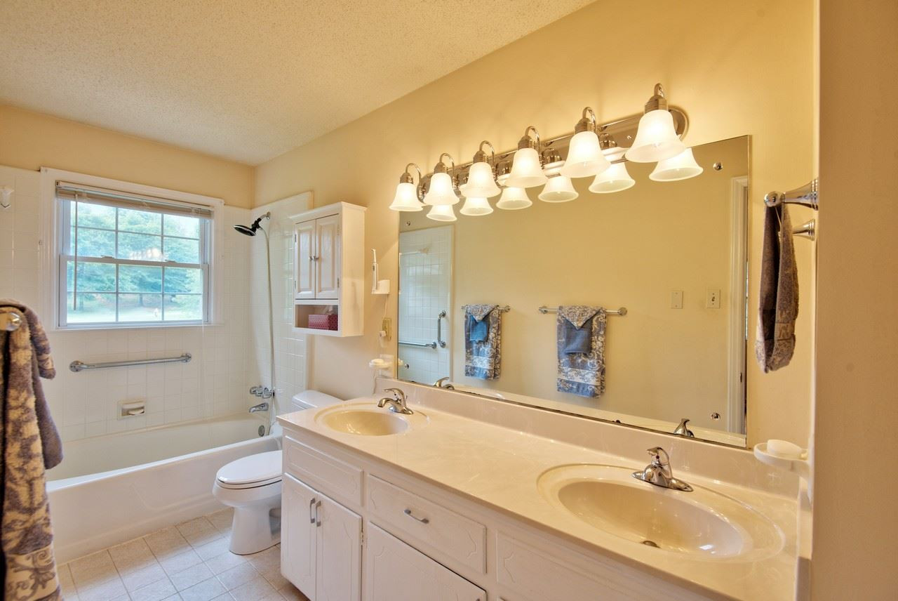 3607 Cole Mill Road Durham, NC 27712 - Photo 16 of 25 The Master Bath is bright and spacious for the age of the home. Dual Sinks and ample cabinetry! Master Bathroom