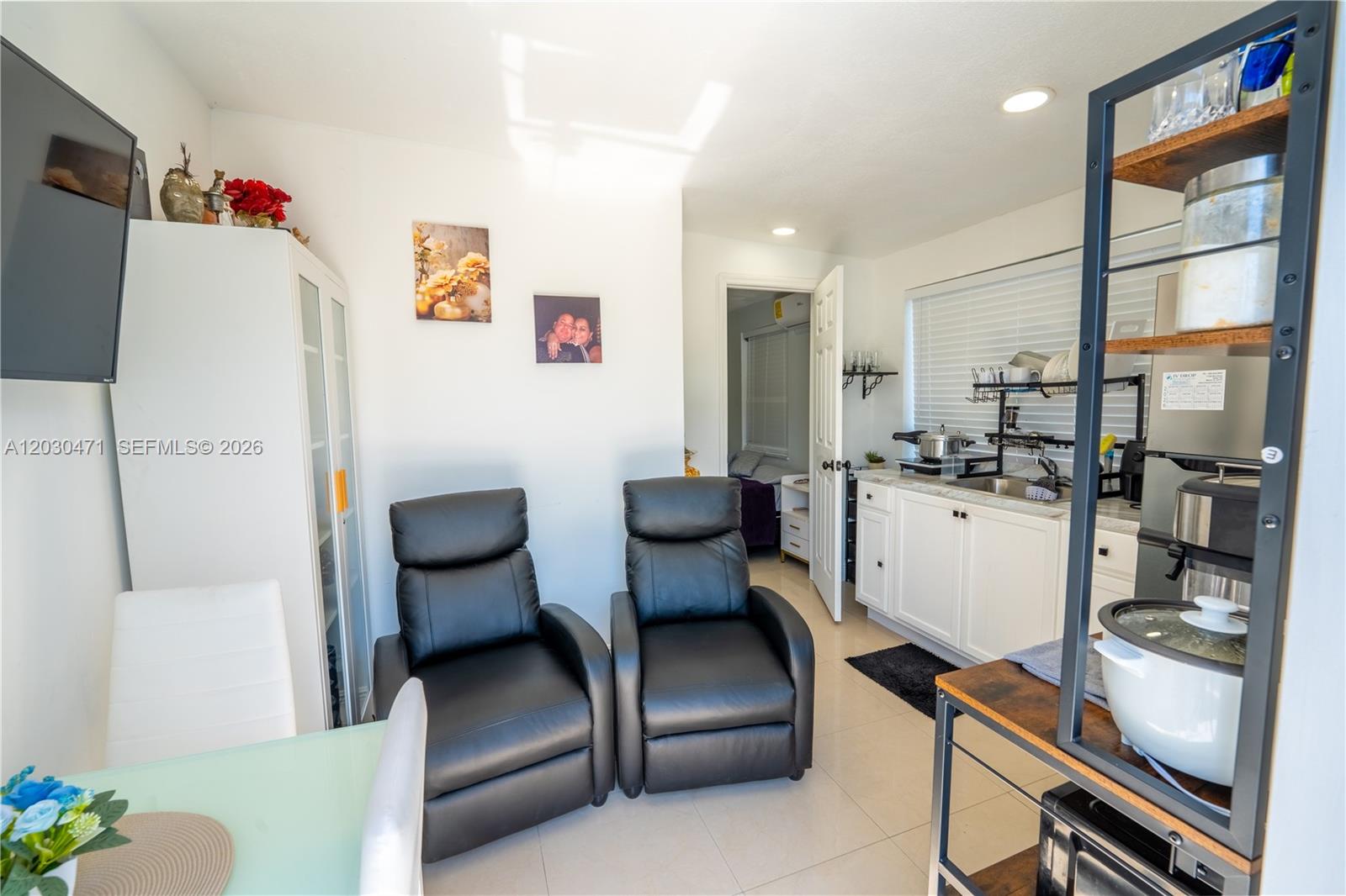 11851 Southwest 181st Street Miami, FL 33177 - Photo 19 of 25 a living room with furniture