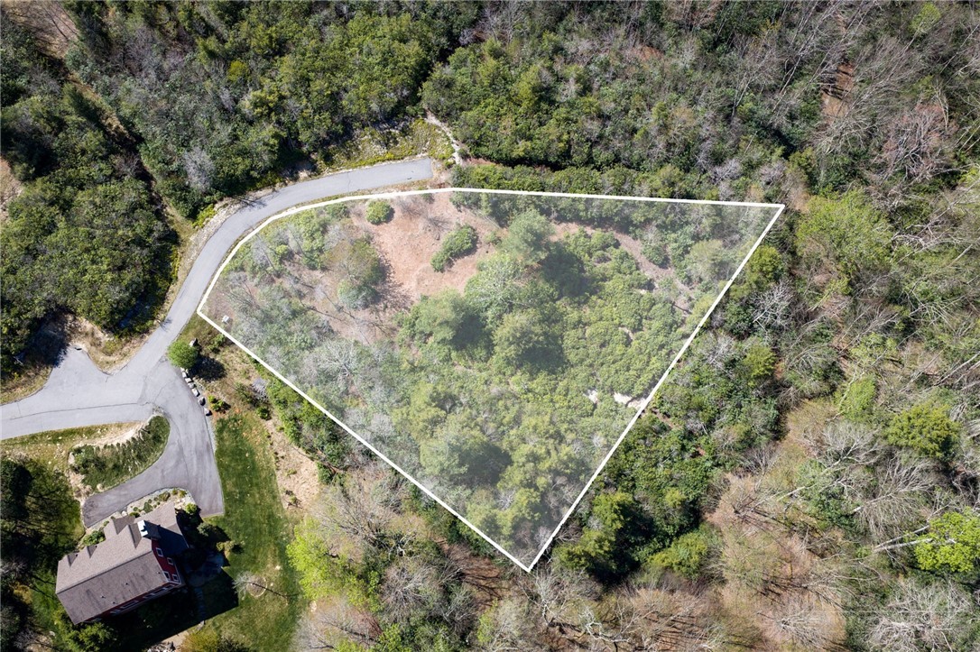 Owls Brow Ridge Blowing Rock, NC 28605 - Photo 32 of 32 an aerial view of a house with a yard and large trees