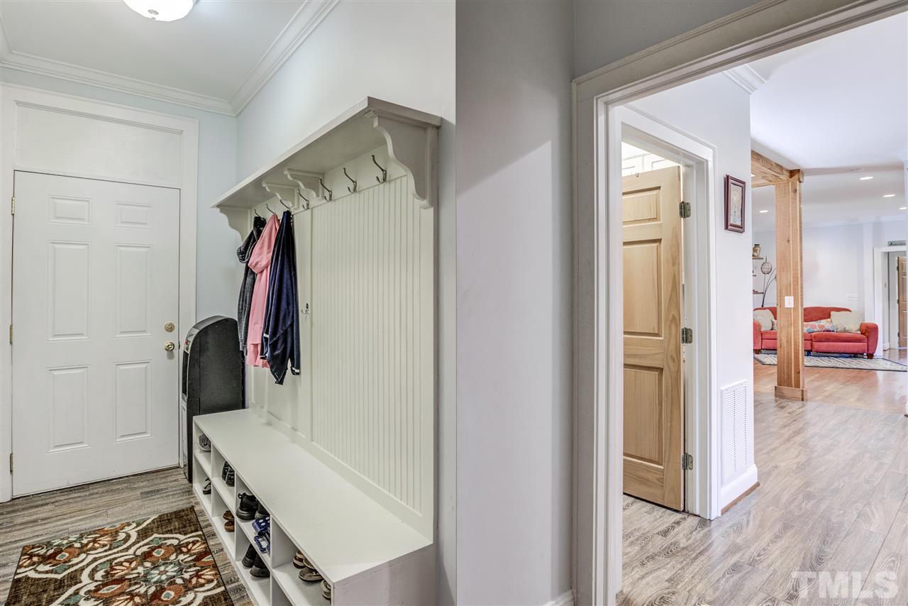 9554 Valley Road Middlesex, NC 27557 - Photo 12 of 30 a view of walk in closet with clothes and shoes