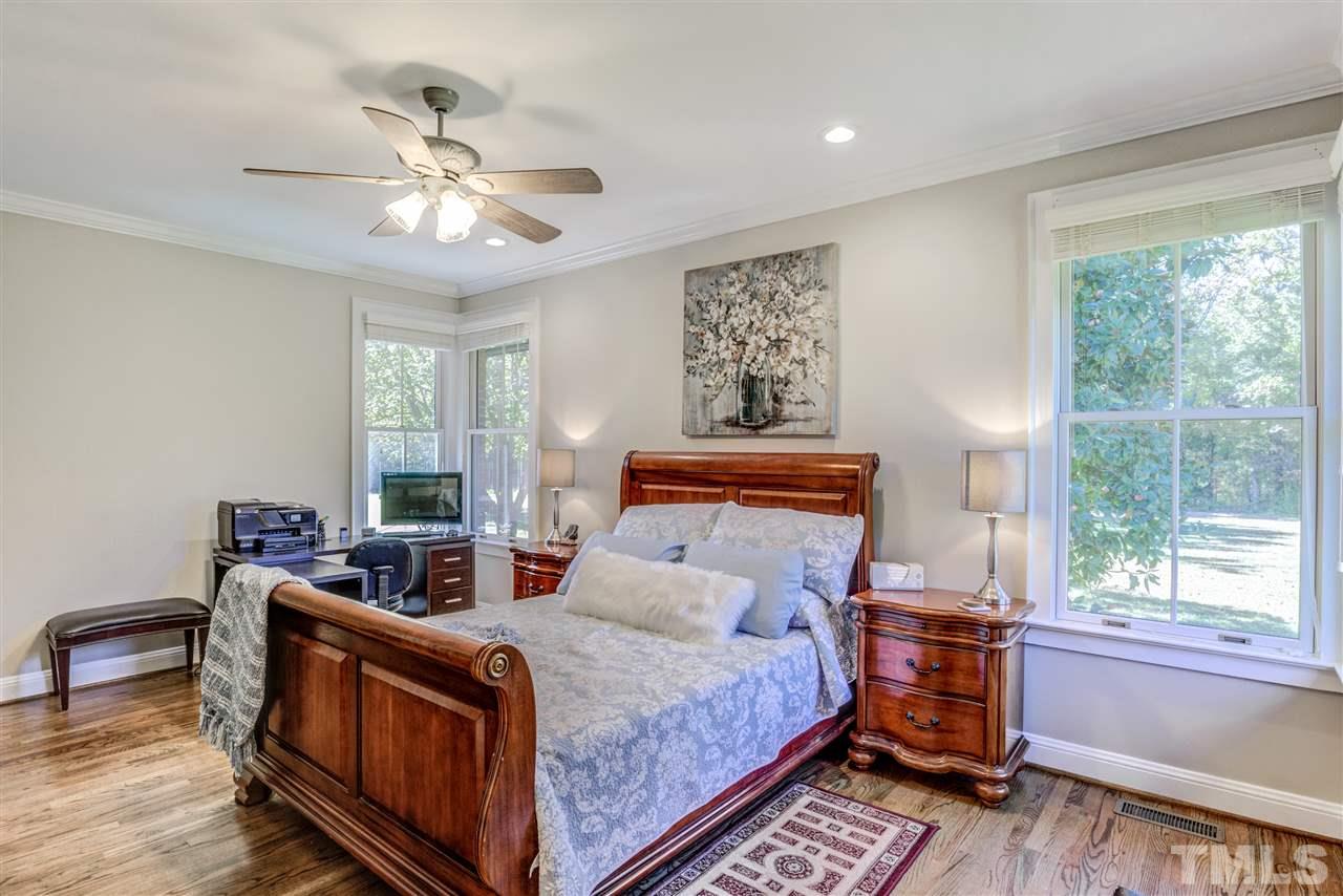 9554 Valley Road Middlesex, NC 27557 - Photo 15 of 30 a bed room with a bed and a window