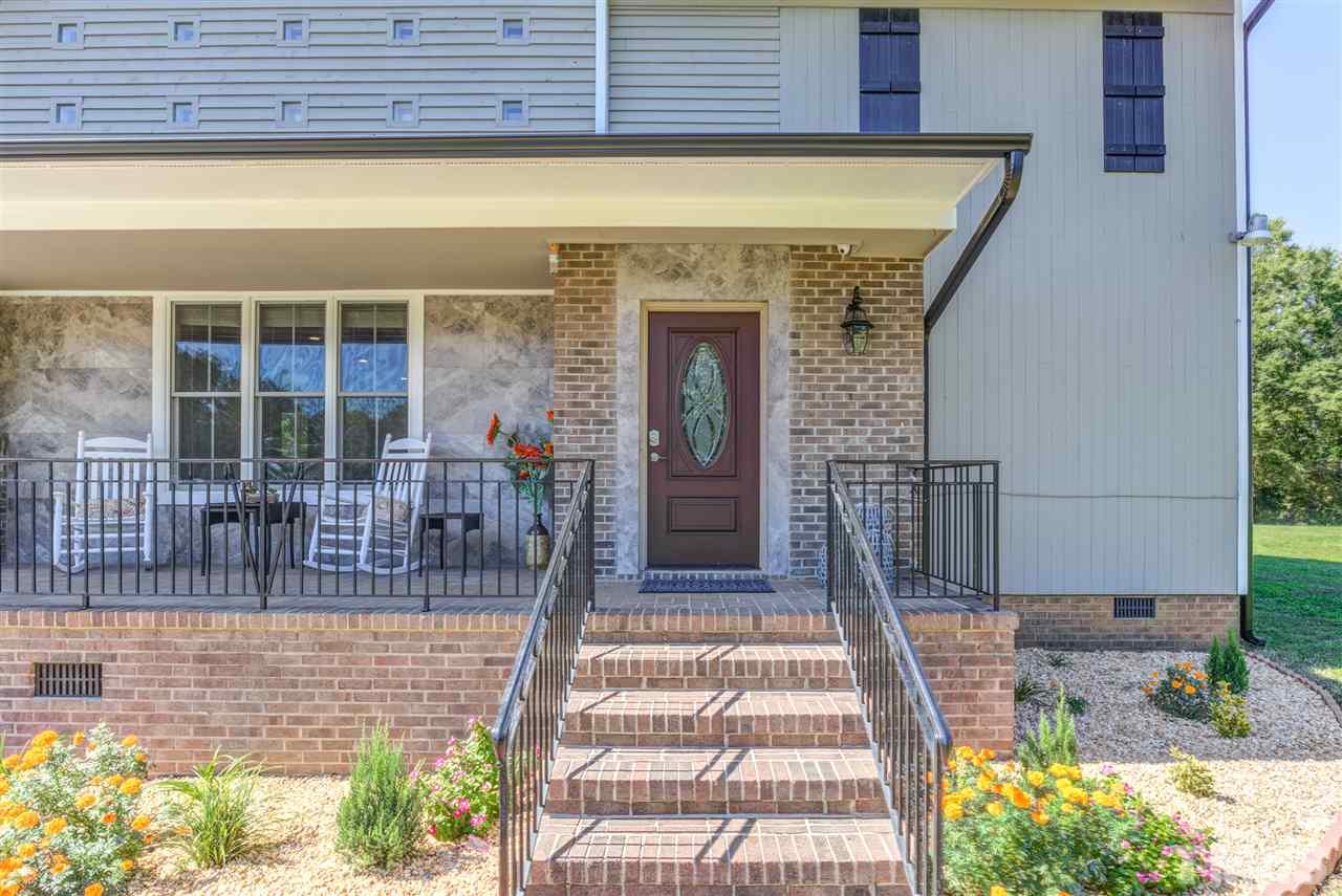 9554 Valley Road Middlesex, NC 27557 - Photo 3 of 30 a view of front door of house with potted plant