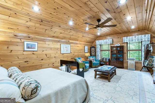 a bed room with a bed and a table