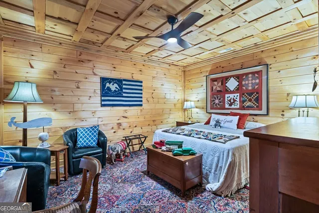 a bathroom with a sink a mirror and a painting on the wall