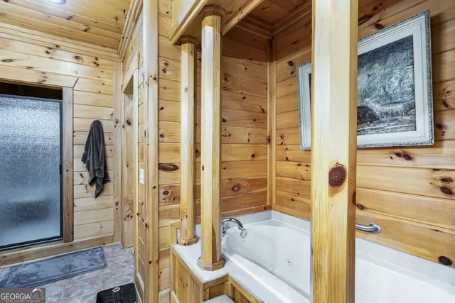 a bathroom with a sink and a window