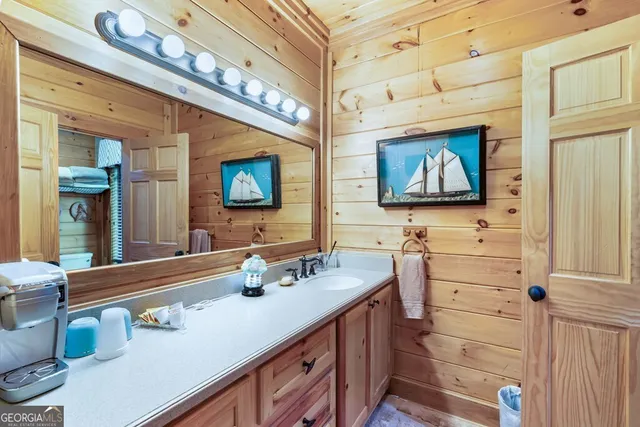 a view of living room with balcony and furniture