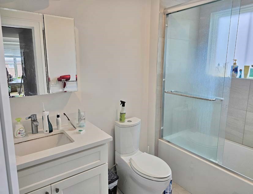 13 Greylock Road Boston, MA 02134 - Photo 15 of 17 a bathroom with a sink a toilet and shower